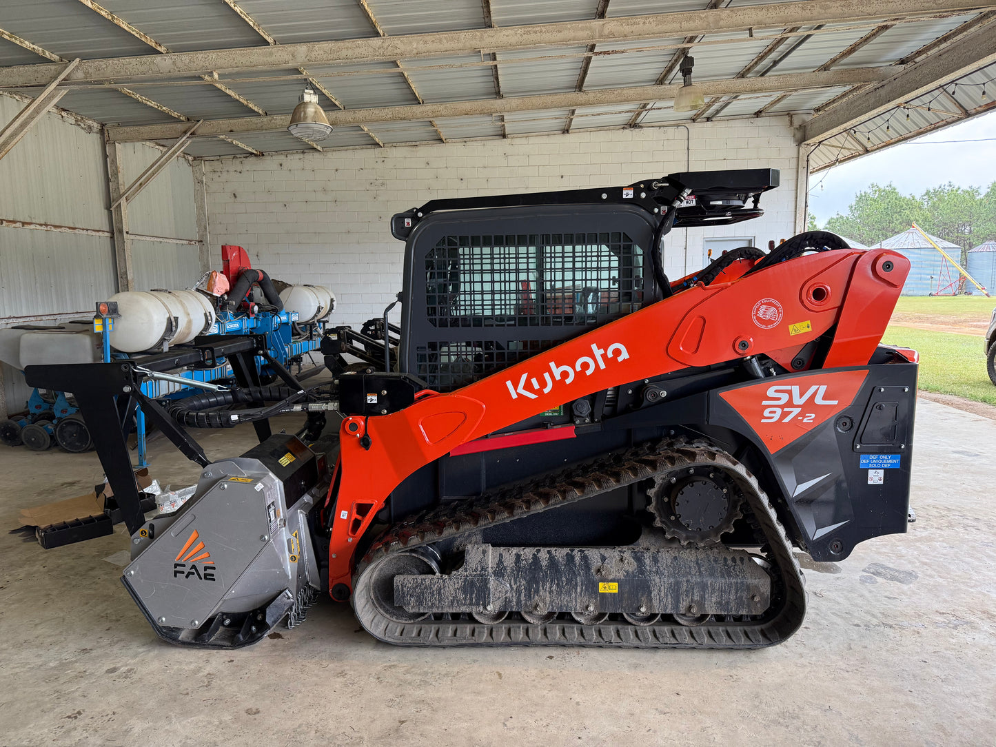 Kubota SVL97-3 with FAE Mulching Head Package