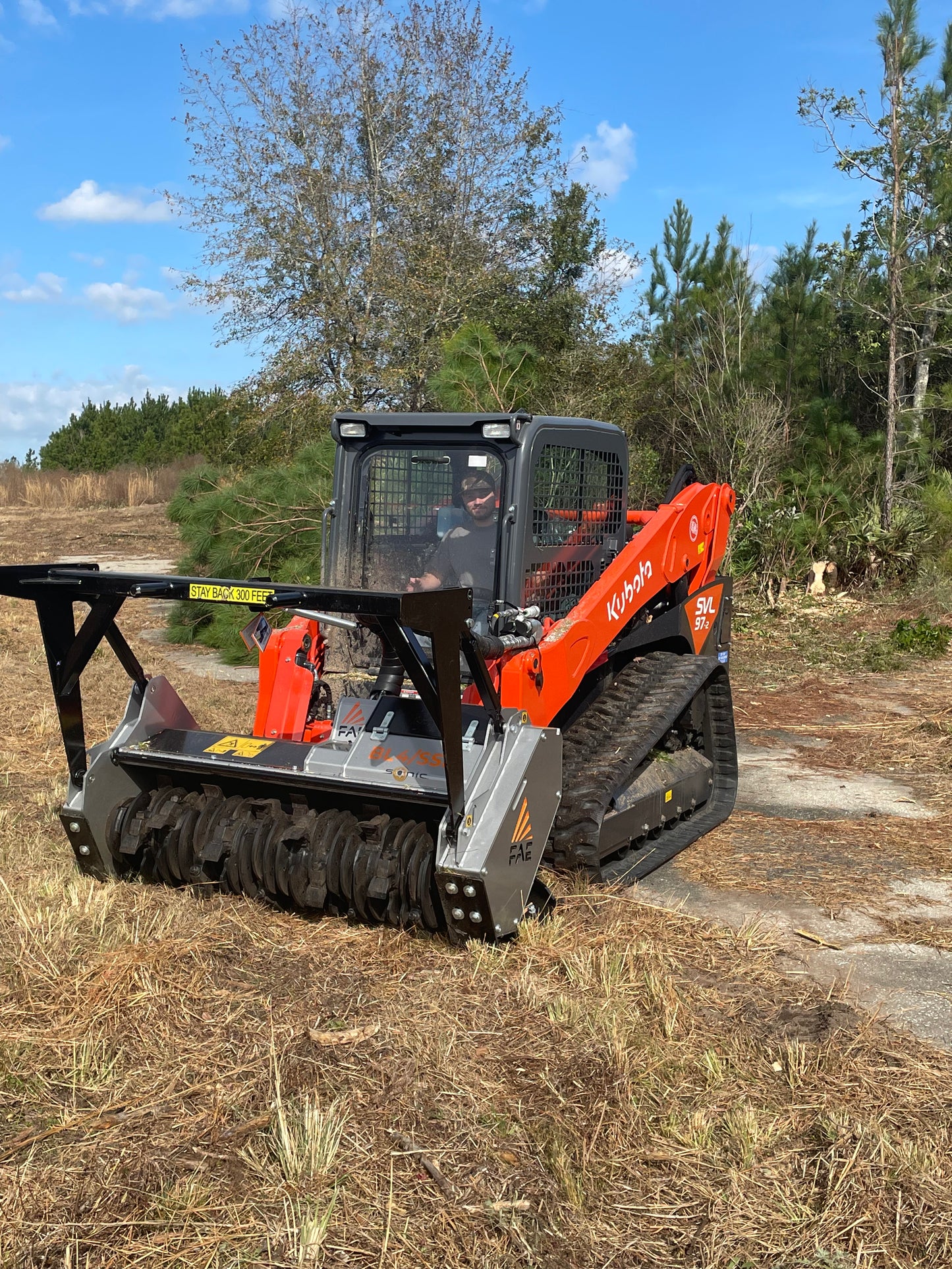 Kubota SVL97-3 with FAE Mulching Head Package